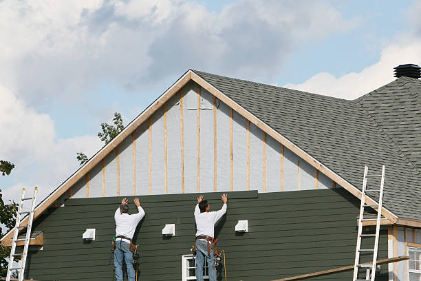 Professional Siding Installation technician working in Wye Mills, MD
